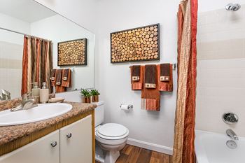 Bathroom with Ceramic Tile Tub Shower at Salt Lake City Studio Apartments